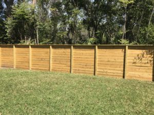 The inside of a horizontal woood fence design